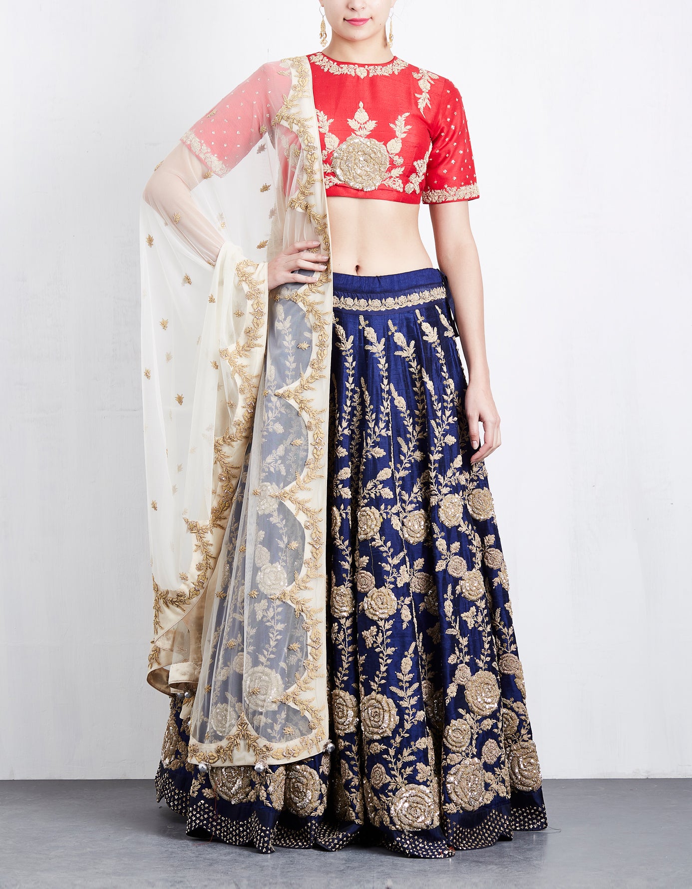 Powder blue lehenga skirt with Navy blue embroidered blouse
